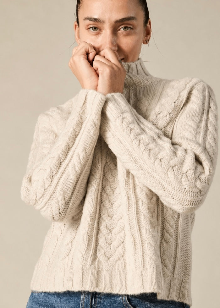 Sonya Hopkins 100% cashmere turtleneck in a chunky hand knit cable in pale marle beige