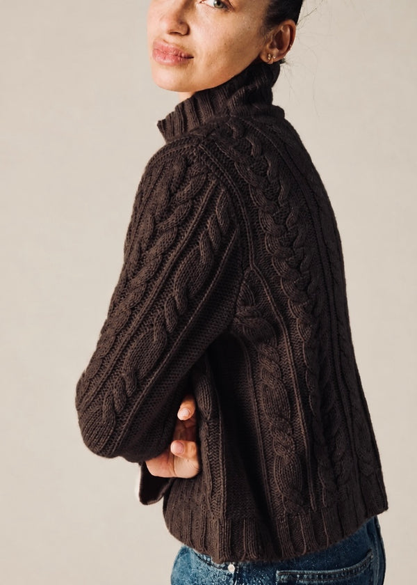 100% cashmere turtleneck in a chunky hand knit cable in chocolate marle brown